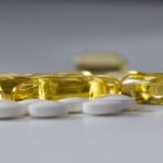 a close up of many pills on a table